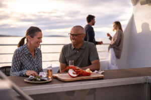 On-Board_Odalisque-III_Southwest-Tasmania_Dining_Cuisine_Couple-2-scaled