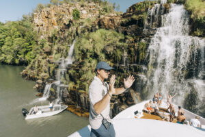True-North-The-Kimberley_Crew-And-Guests_Waterfall-scaled