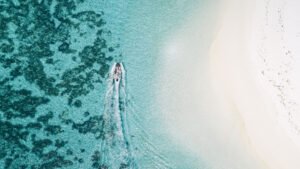 True-North_Rowley-Shoals_Overhead-Boat_Hero-scaled