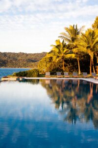 qualia_Great-Barrier-Reef_Sunset-Pebble-Beach-Pool